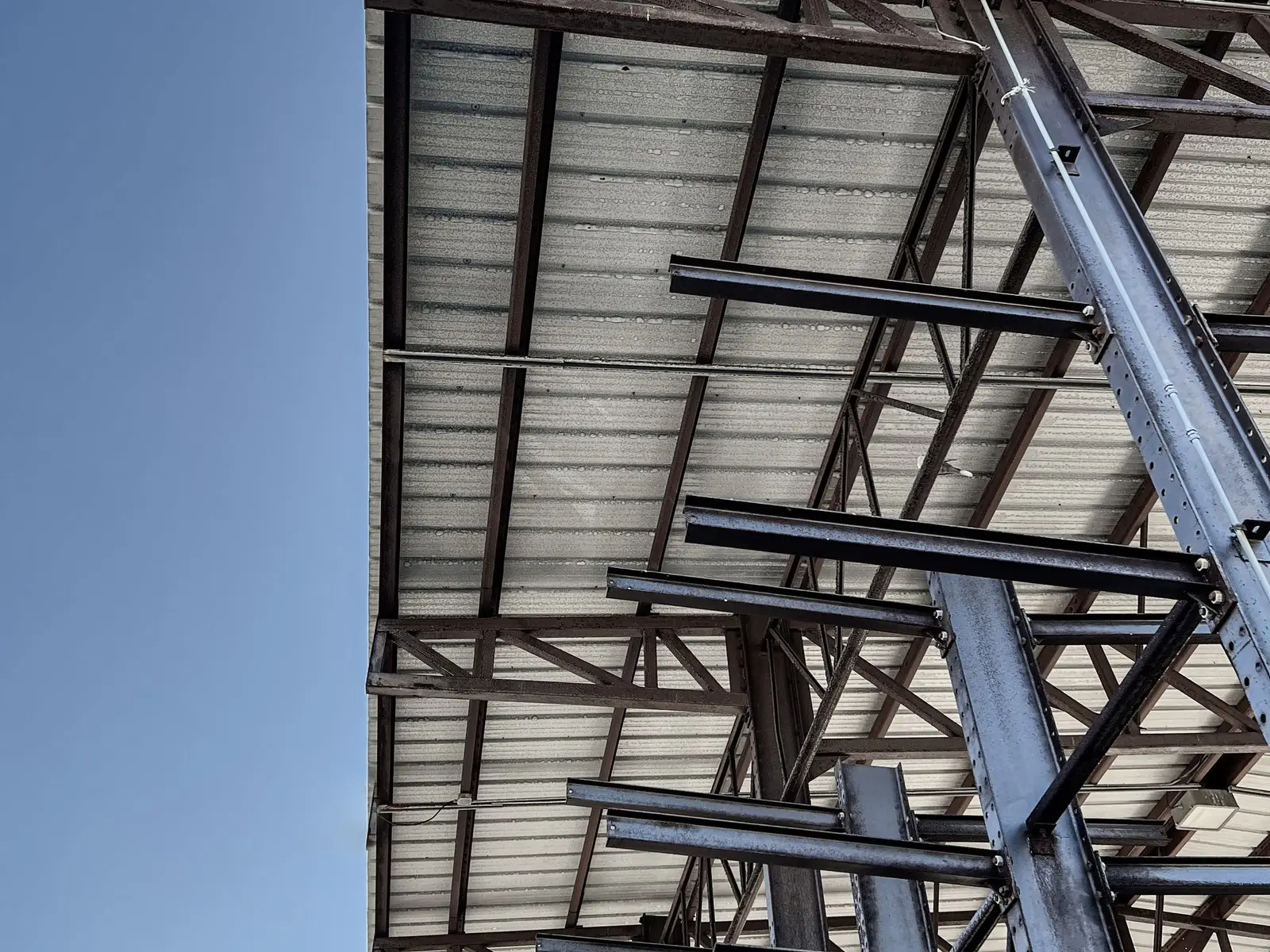 Steel roof framing on a building under construction